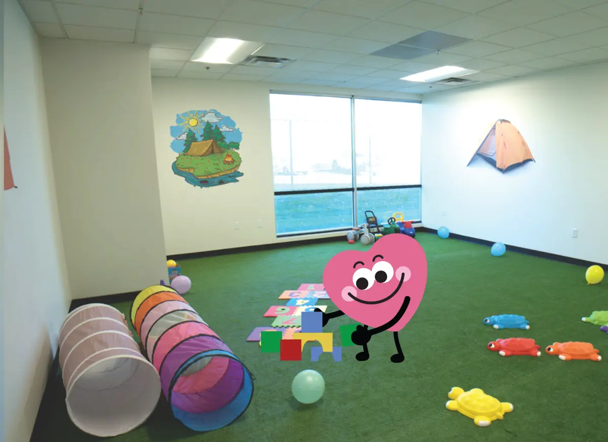 ABA therapy play space with turf floor and toys at Autism Centers of Utah