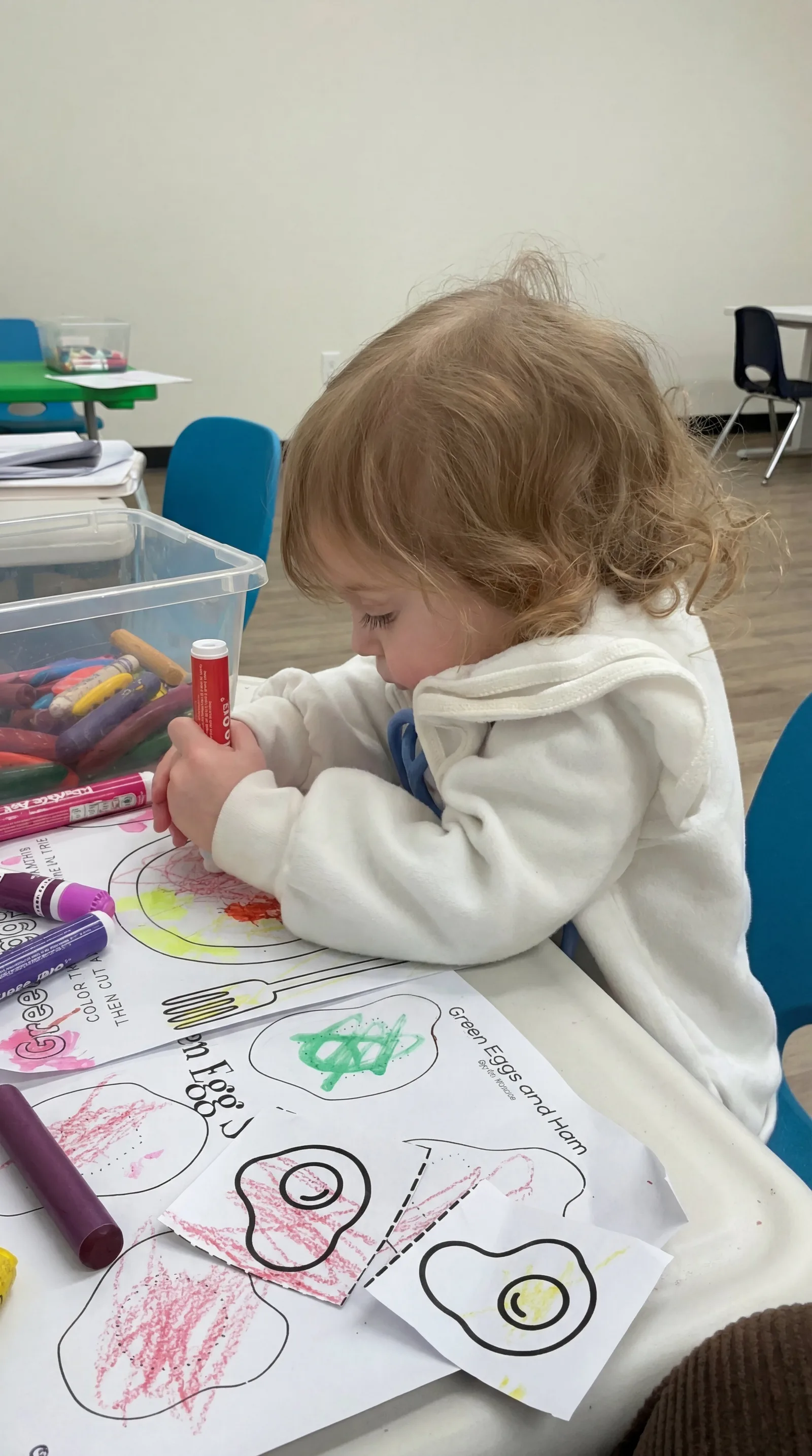 Child drawing at Autism Centers of Utah