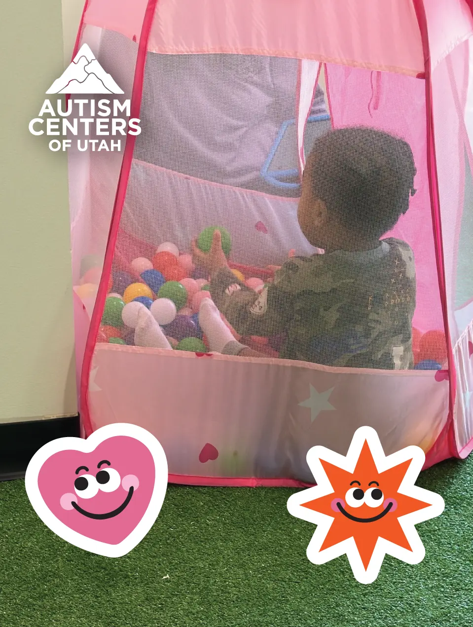 Child exploring sensory play activities at Autism Centers of Utah