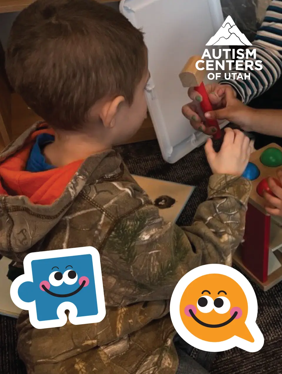 Child and therapist working together on communication skills at Autism Centers of Utah